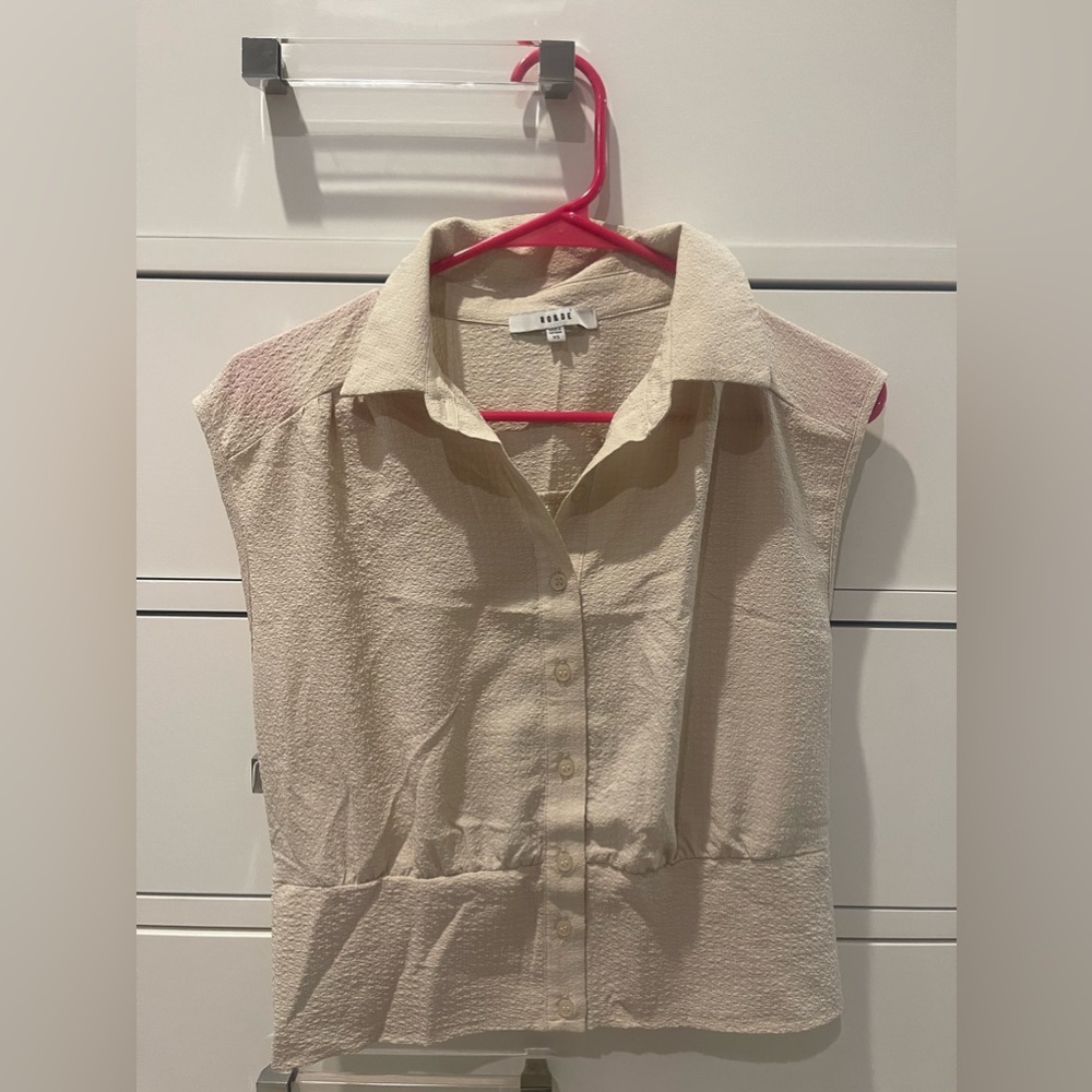 Cute cream colored top.